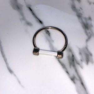 White and gold ring